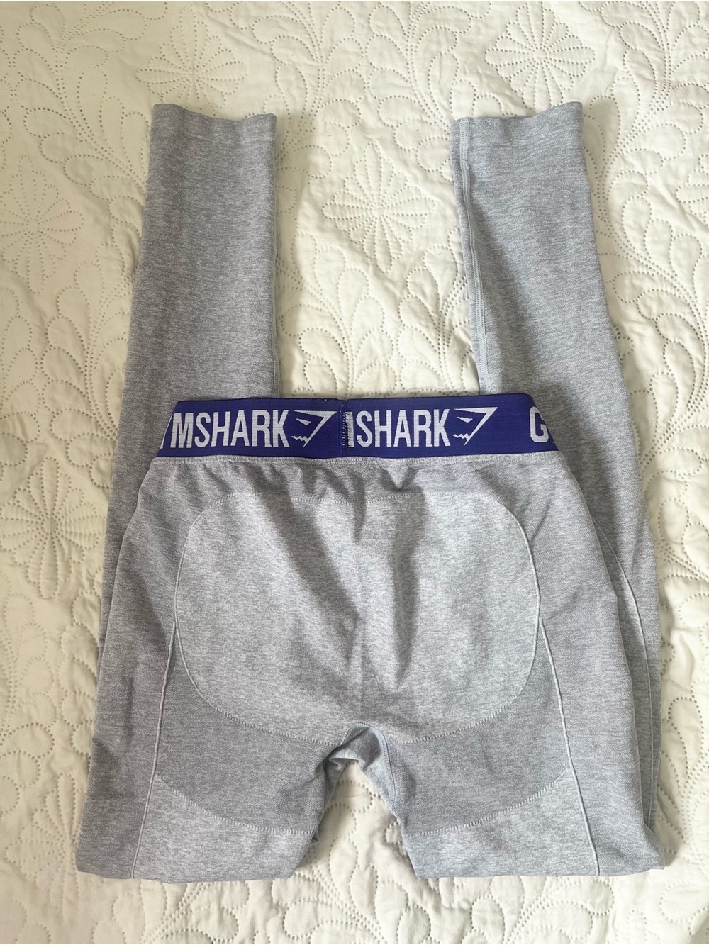 Woman’s Gymshark Gray and Purple Leggings. Full length. Medium